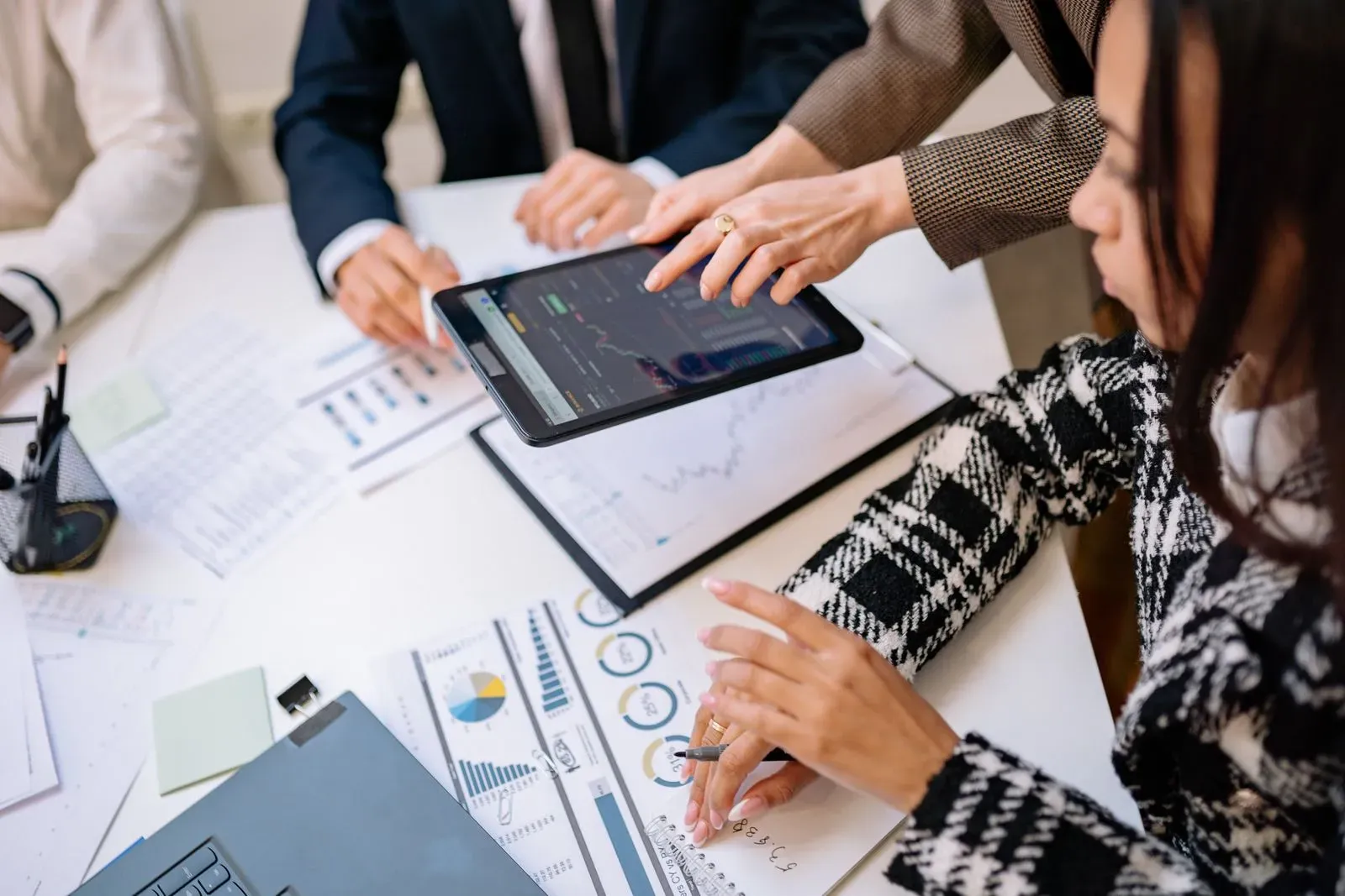 Marketing leader reviewing website conversion data on a tablet