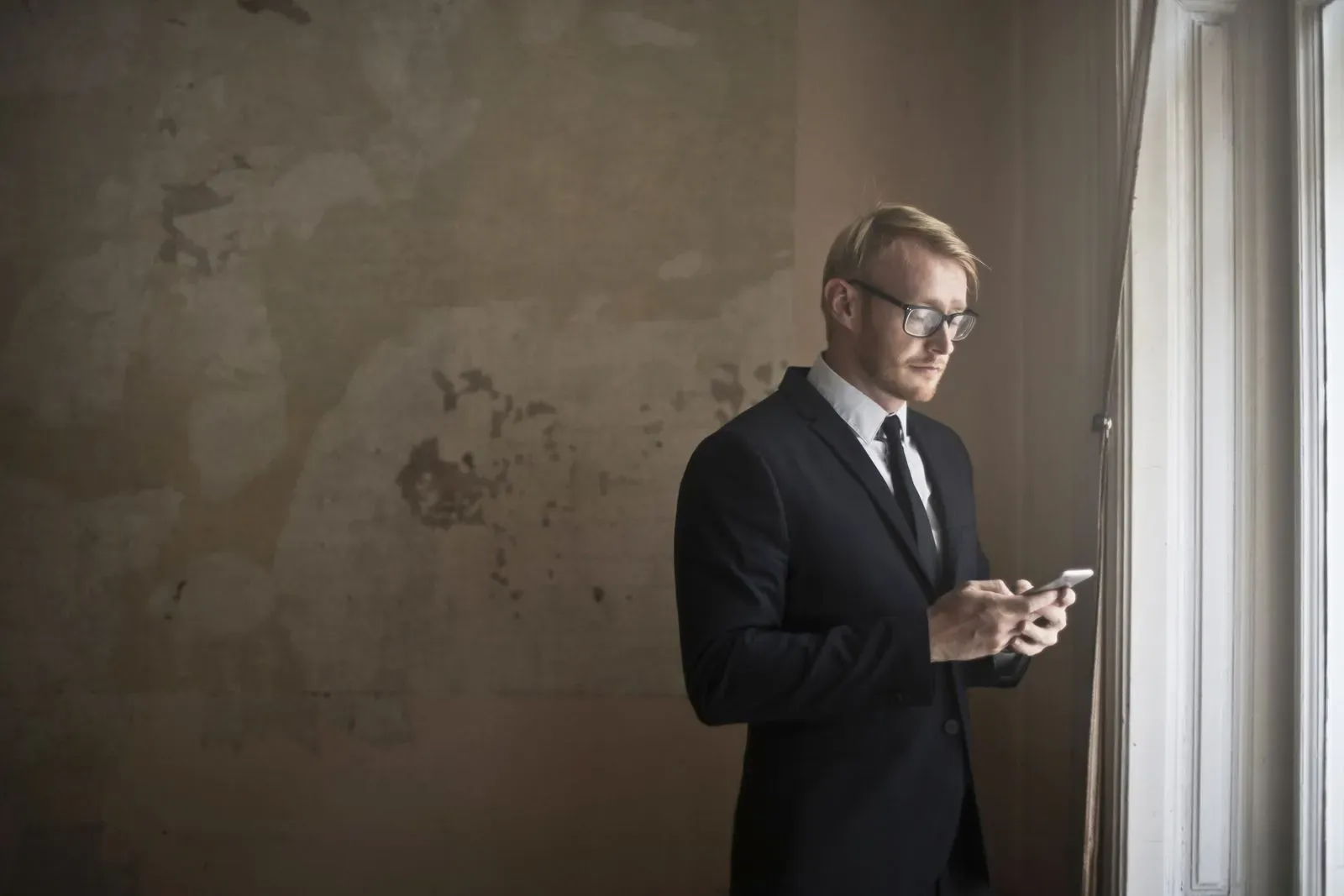 Business executive using a smartphone