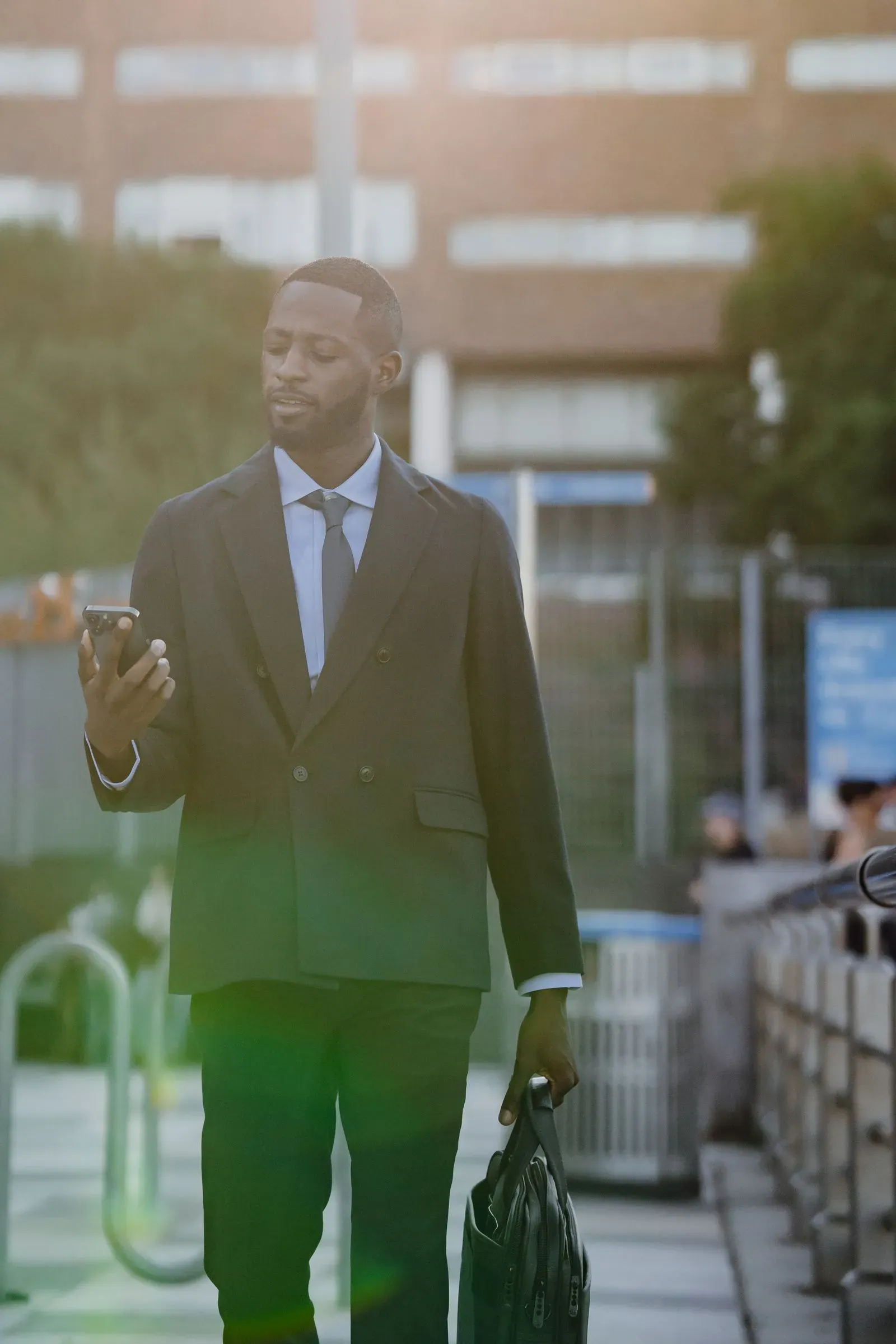 Decision maker checking LinkedIn on his phone