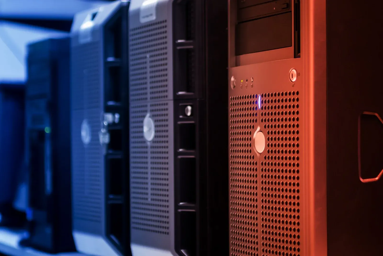 Technician performing server maintenance in a data center